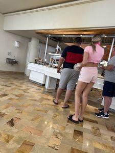 Hot teen chick wearing a pink top and shortrs creepshots, amazing long legs