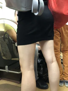 Girl with Hot Ass and Legs with Pale Skin in a Dress Standing in a Subway Train Candid Closeup