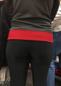 Pretty girl shopping with boyfriend in leggings with a nice ass