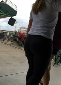 Big booty babe at a baseball game in tight leggings
