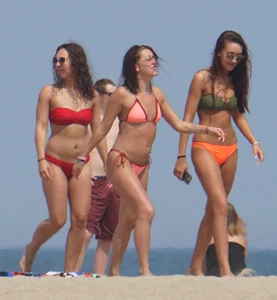 3 sexy girls on the beach in bikinis