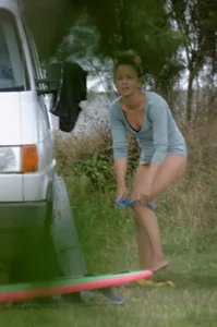 Girl getting out of her swimsuit and changing her panties while flashing pubes