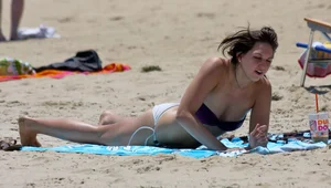 Two beach friends looking sexy in bikinis
