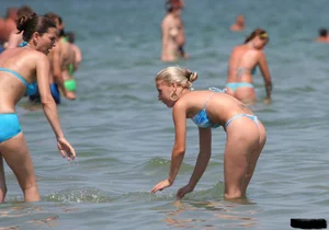A bunch of sexy beach voyeur babes in bikinis, thongs and topless