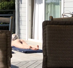 Hot Blonde in Panties Sunbathing on Her Porch Sneaky Candid Photo