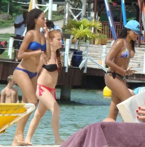 Amazing ebony ass in blue bikini with other sexy friends in bikinis