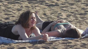 Girls in Underwear Lying on Sand Beach Creepshot