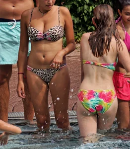 Hot big boobed girl in bikini at the pool