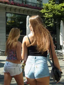 Sexy ass girl walking with friends in short shorts showing her nice ass cheeks