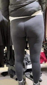 Tall glasses girl shopping in leggings