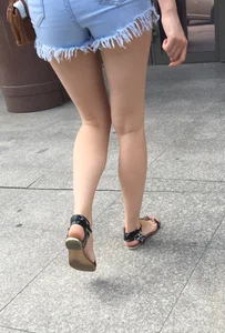 Girl with Hot Legs in Jeans Shorts and Sandals Walking Down the Street City Candid