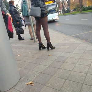 Legs in Pantyhose Bus Closeup