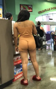 Latina with hard nipples and a big booty in tight spandex shorts outfit