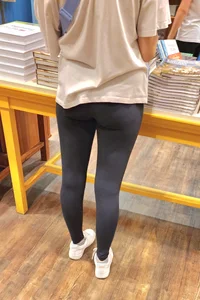 Teen booty in leggings at the store
