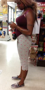 Black girl with a sexy ass in tight grey heart leggings