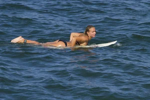 Candid surfer babes on the beach and in bikinis