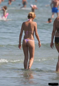 A bunch of sexy beach voyeur babes in bikinis, thongs and topless