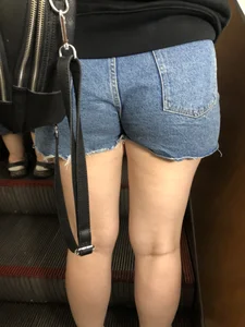 Hot Booty In Blue Jean Shorts And Chunky Legs Creepshots Gallery on a Subway Escalator