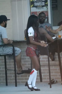 Sexy ebony Tilted Kilt employee in her uniform