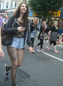 Candid cunny brunette in pantyhose and shorts showing her ass cheeks