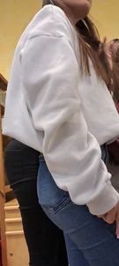 Girl is showing her blue jeans