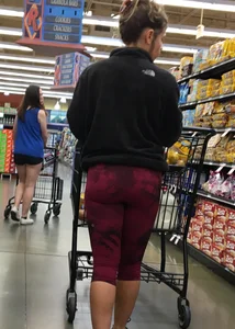 Milf grocery shopping in red leggings with a great ass