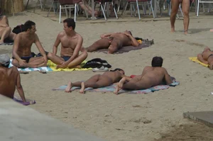 Topless girls on a beach in Barcelona