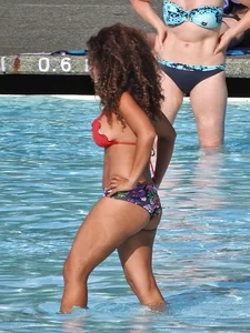 Hot ass milf with an amazing body at the pool