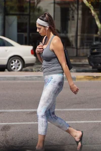 Flat ass brunette walking in leggings with big boobs