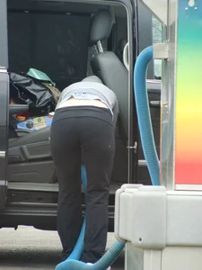 Girls cleaning their cars in jeans and pants