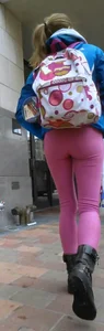 Skinny Girl With a Backpack in Pink Tight Pants Low Angle Photos