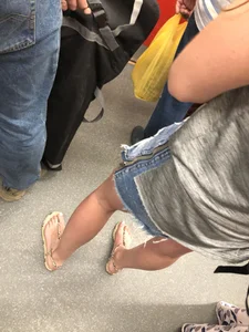 Girl in Denim Mini Shorts and Sandals With Sexy Legs And Feet Street and Subway Photos