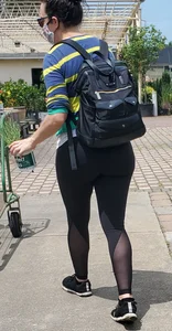 Big booty brunette buying plants in tight leggings
