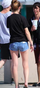 Candid skinny college girl in denim shorts showing some cheeks