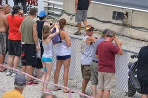 Skinny babe with a cute little ass in tiny blue shorts