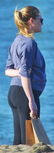 Beach blonde in leggings with a decent booty
