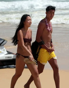 Sexy Asian on the beach with nice boobs and ass
