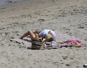 Hilary Duff in purple bikini in Malibu with a great ass and hard nipples