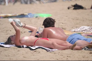 Girls on a nude beach in Bibione, Italy