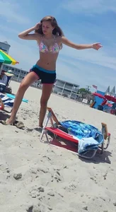 Gorgeous Looking Girl in Swimsuit on the Beach