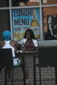 Sexy ebony Tilted Kilt employee in her uniform