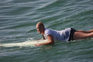 Candid surfer babes on the beach and in bikinis