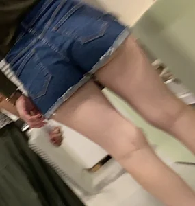 Candid ass in jean shorts closeup at the supermarket