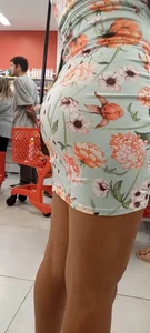 Hot skinny girl in flowered skirt