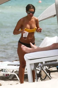 Frankie Bridge nip slips in a bikini on the beach