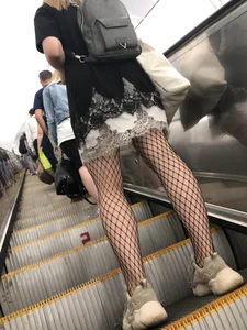 Cute Girl in Lacey Semi-Transparent Dress and Fishnet Pantyhose Subway Escalator Candid Photos Gallery