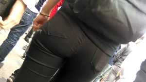 Firm petite ass in blacj tight jeans closeup