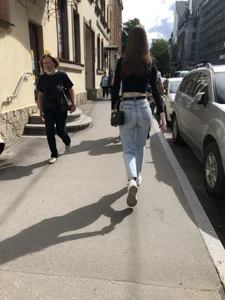 Awesome booty in ripped tight jeans street photos
