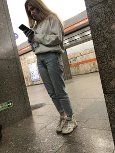 Hot Girl in Tight Blue Cameltoe Jeans And Sneakers on the Subway Station, Great Ass