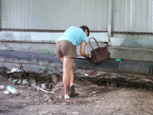 Sticky Girl with Muscular Legs Bend Over Writing Something